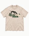 Follow the Unseen German Shorthaired Pointer Washed Tee in Apricot, flat lay product photo