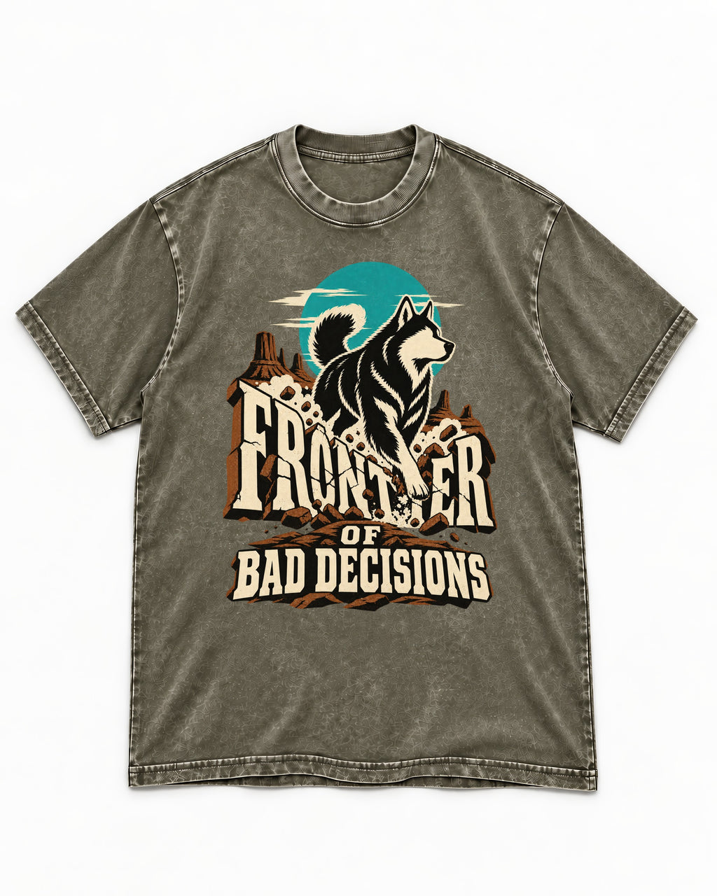 Husky Frontier of Bad Decisions Desert Graphic Washed Tee in Army Green, flat lay product photo