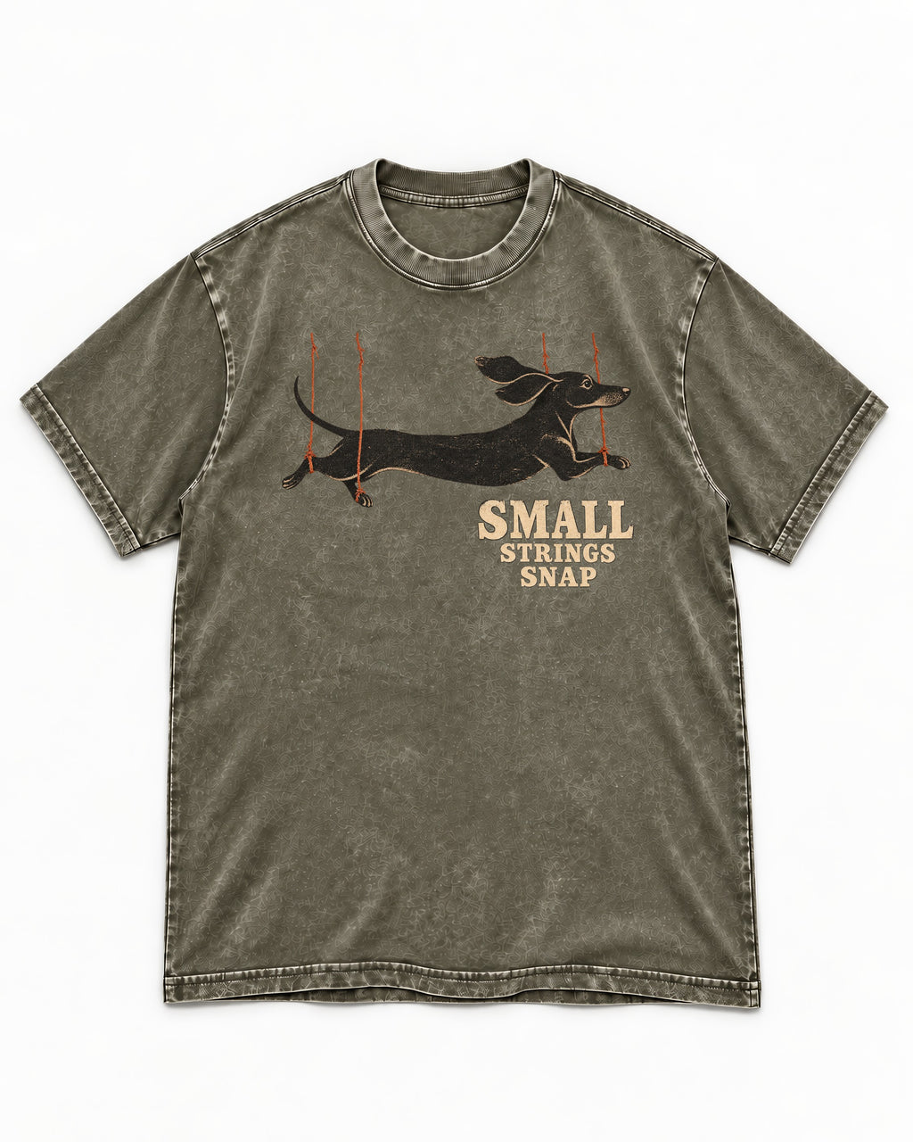 Dachshund Small Strings Snap Marionette Graphic Washed Tee in Army Green, flat lay product photo