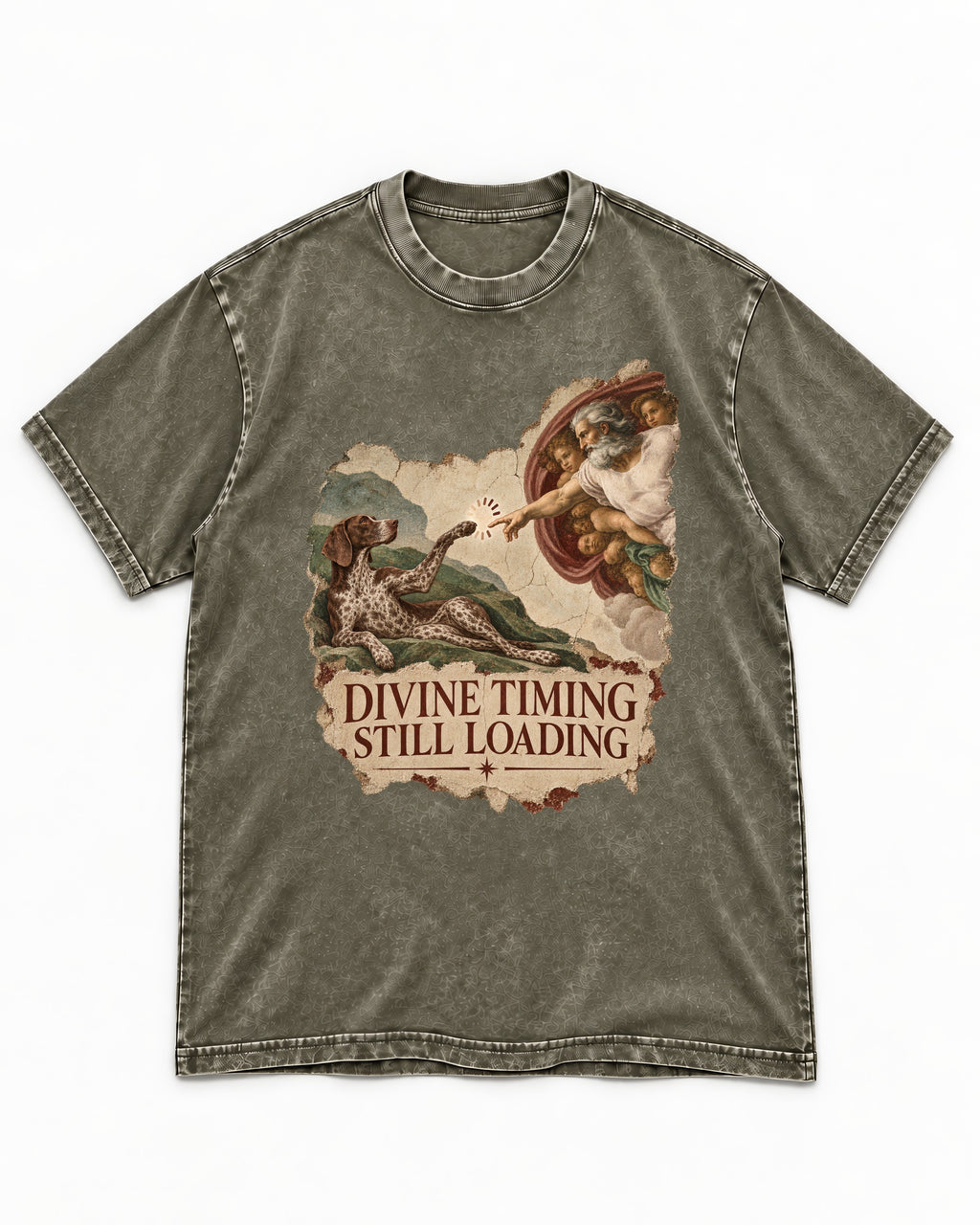 German Shorthaired Pointer Divine Timing Still Loading Creation Scene Graphic Washed Tee in Army Green, flat lay product photo
