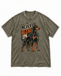 Doberman Never Blend In Brush Graphic Washed Tee in Army Green, flat lay product photo