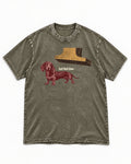 Dachshund Small World Below Giant Shoe Graphic Washed Tee in Army Green, flat lay product photo