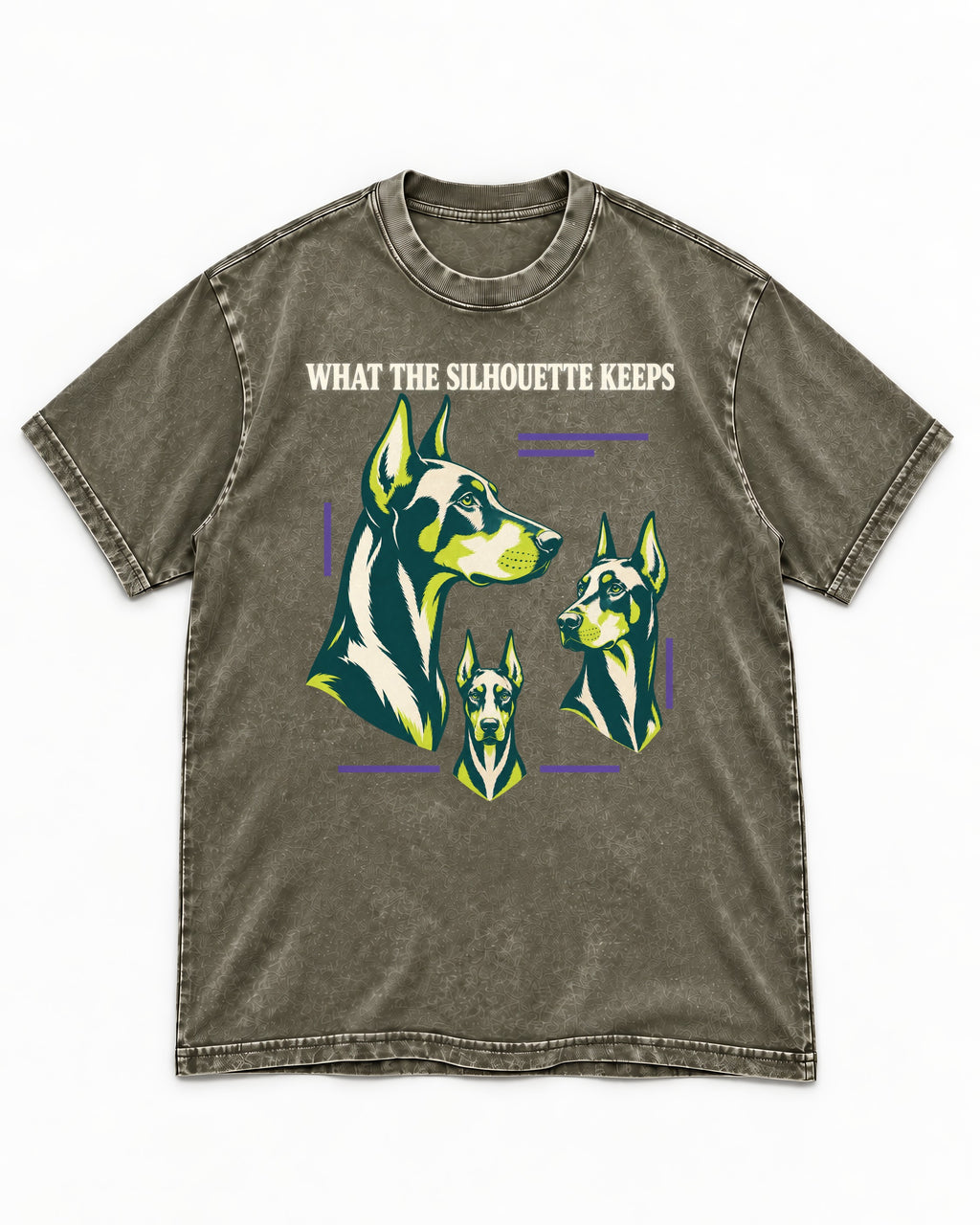 Doberman What the Silhouette Keeps Three Portrait Graphic Washed Tee in Army Green, flat lay product photo