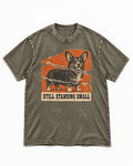 Corgi Still Standing Small Torn Poster Washed Tee in Army Green, flat lay product photo