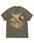 Husky Divine Timing Still Loading Creation Parody Graphic Washed Tee in Army Green, flat lay product photo