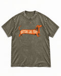 Dachshund Bottom Line First Body Lettering Graphic Washed Tee in Army Green, flat lay product photo