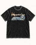 Dachshund Softly Spoken Here Reclining Portrait Graphic Washed Tee in Black, flat lay product photo