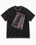 Dachshund Hold That Note Striped Rug Graphic Washed Tee in Black, flat lay product photo