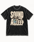 Frenchie Sound Asleep Stone Pillow Graphic Washed Tee in Black, flat lay product photo