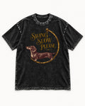 Dachshund Swing Slow Please Necklace Frame Graphic Washed Tee in Black, flat lay product photo