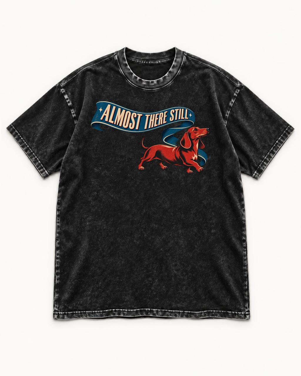 Dachshund Almost There Still Ribbon Graphic Washed Tee in Black, flat lay product photo