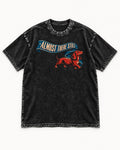 Dachshund Almost There Still Ribbon Graphic Washed Tee in Black, flat lay product photo