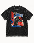 Shih Tzu The Ordinary Is a Portal Door Graphic Washed Tee in Black, flat lay product photo