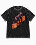 Pitbull Solid Is a Verb Step Type Graphic Washed Tee in Black, flat lay product photo