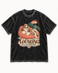 Shih Tzu Lounging Is a Language Retro Lounge Graphic Washed Tee in Black, flat lay product photo