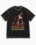 Love Is an Active Stance Boxer Pedestal Graphic Washed Tee in Black, flat lay product photo
