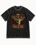 Pomeranian Trust the Hand Under the Table Poker Dogs Graphic Washed Tee in Black, flat lay product photo