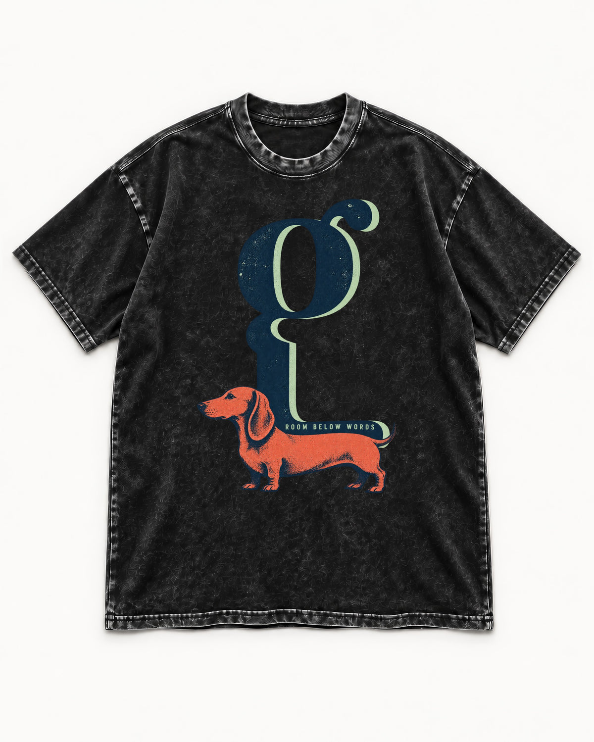 Dachshund Room Below Words Lowercase G Graphic Washed Tee in Black, flat lay product photo