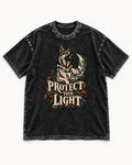 Protect Your Light Moon Botanical German Shepherd Dog Graphic Washed Tee in Black, flat lay product photo