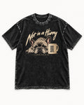 Frenchie Not in a Hurry Coffee Graphic Washed Tee in Black, flat lay product photo