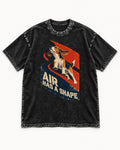 Air Has A Shape Beagle Jumping Graphic Washed Tee in Black, flat lay product photo