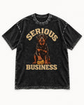 Rottweiler Serious Business Ball Under Paw Graphic Washed Tee in Black, flat lay product photo
