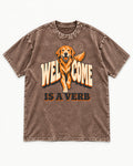 Golden Retriever Welcome Is a Verb Washed Tee in Coffee, flat lay product photo