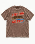 Dachshund Keep Low Go Far Washed Tee in Coffee, flat lay product photo