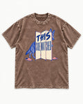 This Side Watched by German Shepherd Dog Washed Tee in Coffee, flat lay product photo