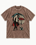 Charm Needs an Alibi Yorkshire Terrier Washed Tee in Coffee, flat lay product photo