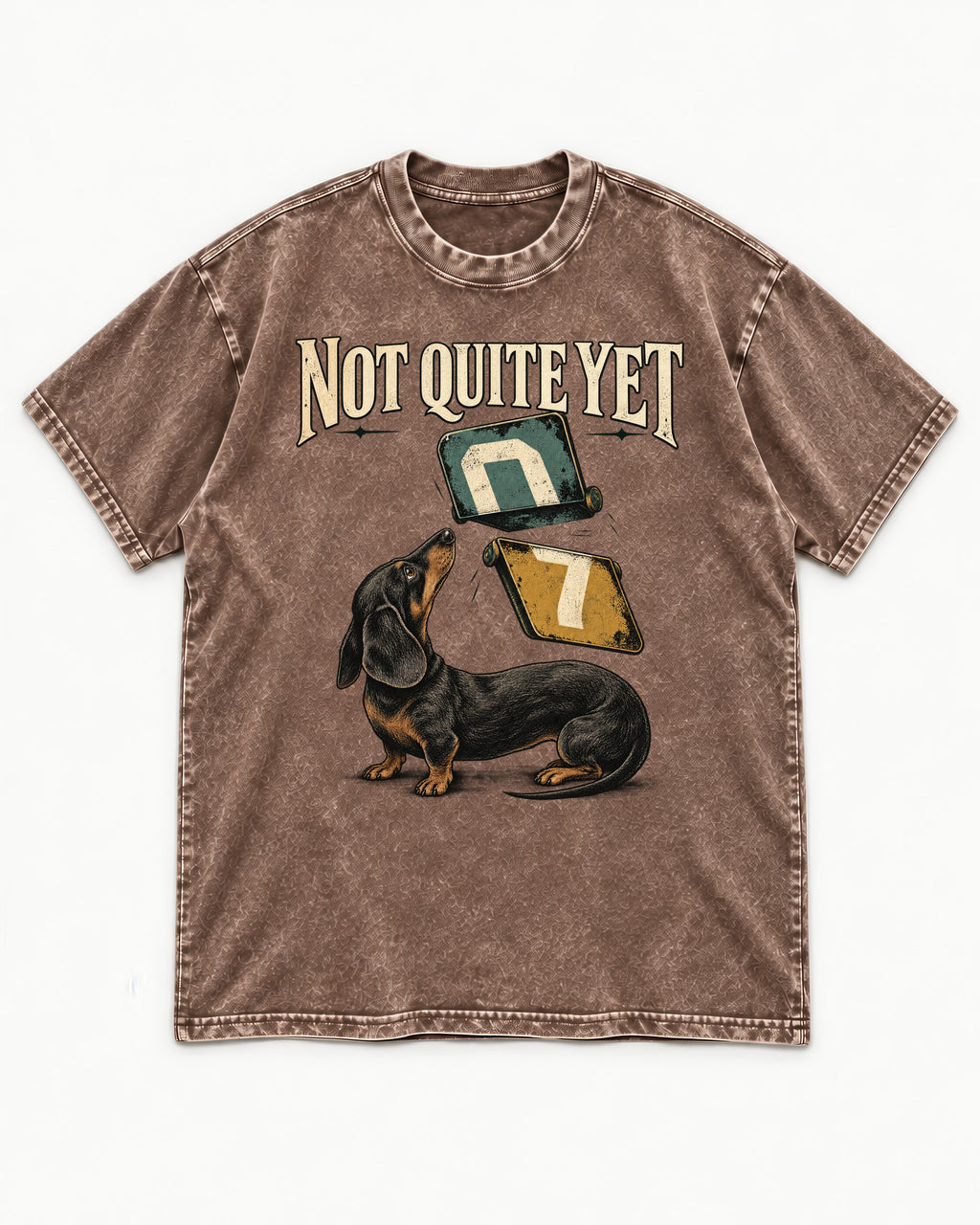 Not Quite Yet Dachshund Washed Tee in Coffee, flat lay product photo