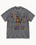 Pitbull Steady Is a Superpower Alphabet Graphic Washed Tee in Gray, flat lay product photo