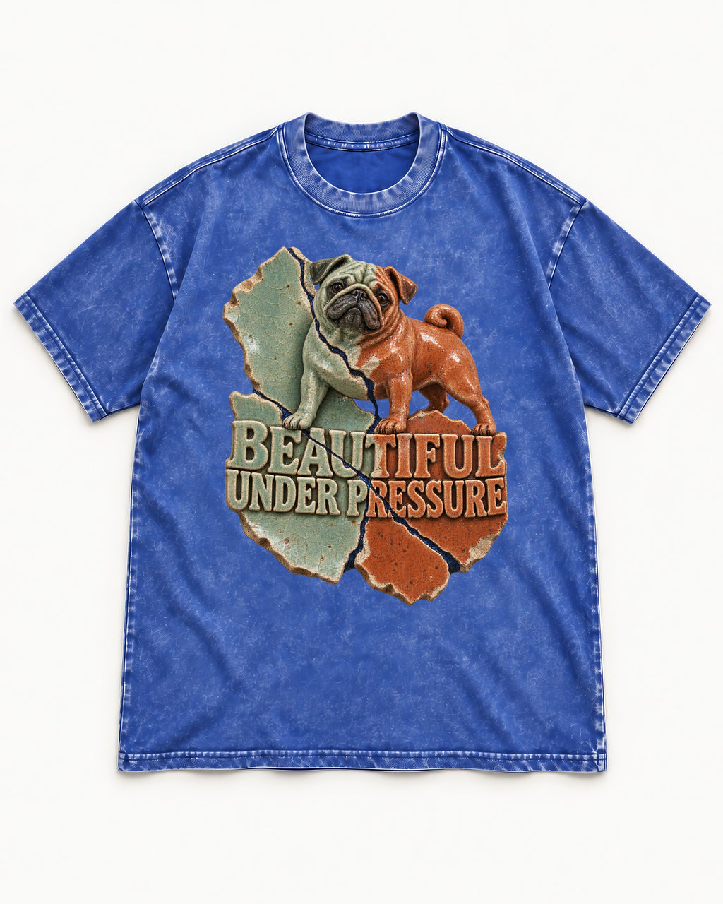 Pug Beautiful Under Pressure Cracked Ceramic Graphic Washed Tee in Royal Blue, flat lay product photo