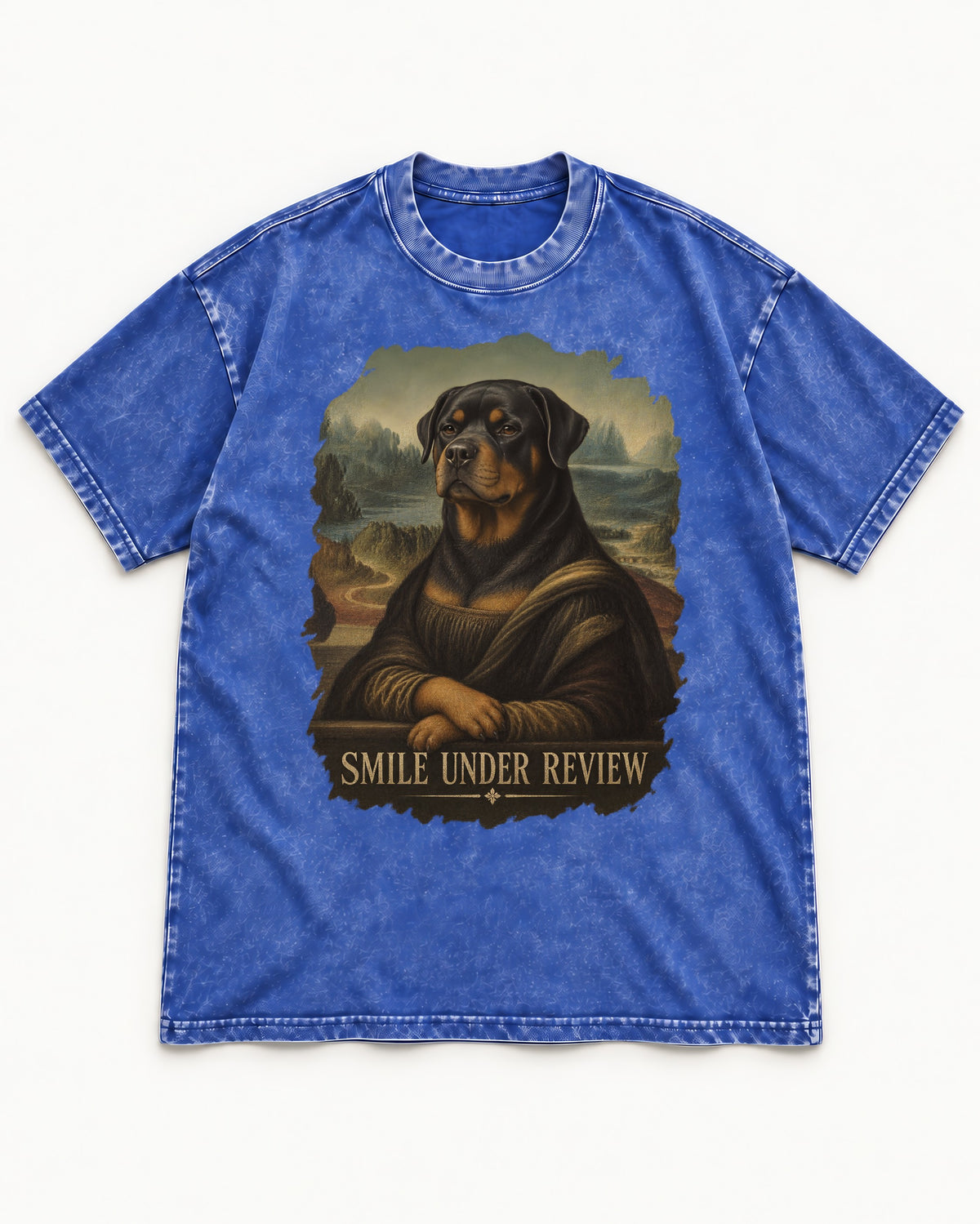 Rottweiler Smile Under Review Renaissance Portrait Graphic Washed Tee in Royal Blue, flat lay product photo