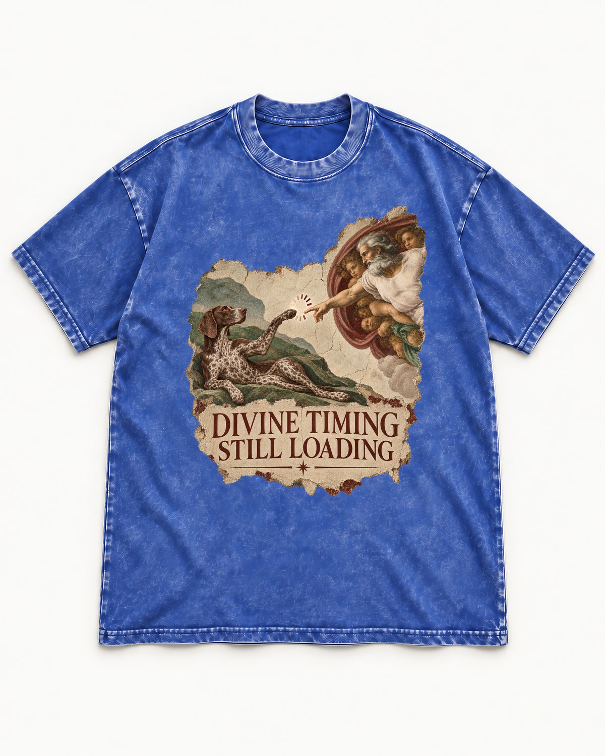 German Shorthaired Pointer Divine Timing Still Loading Creation Scene Graphic Washed Tee in Royal Blue, flat lay product photo
